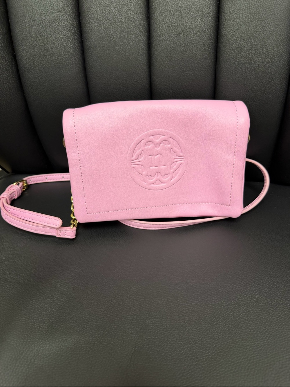 Pink Crossbody Bag with Embossed Medallion